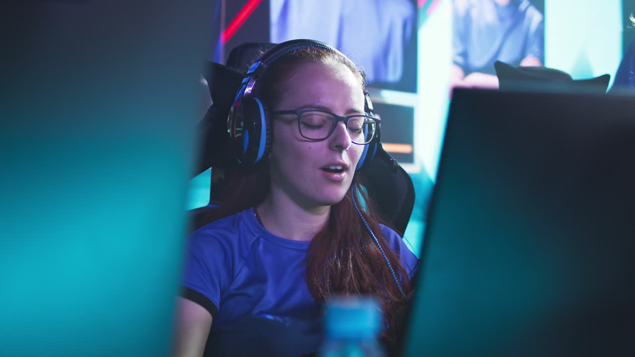 Professional Woman Gamer Concentrated on Esports Competition