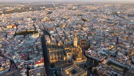 catedral de sevilla. drone shot of the beautiful spanish city of seville at the sunrise, uhd, 4k