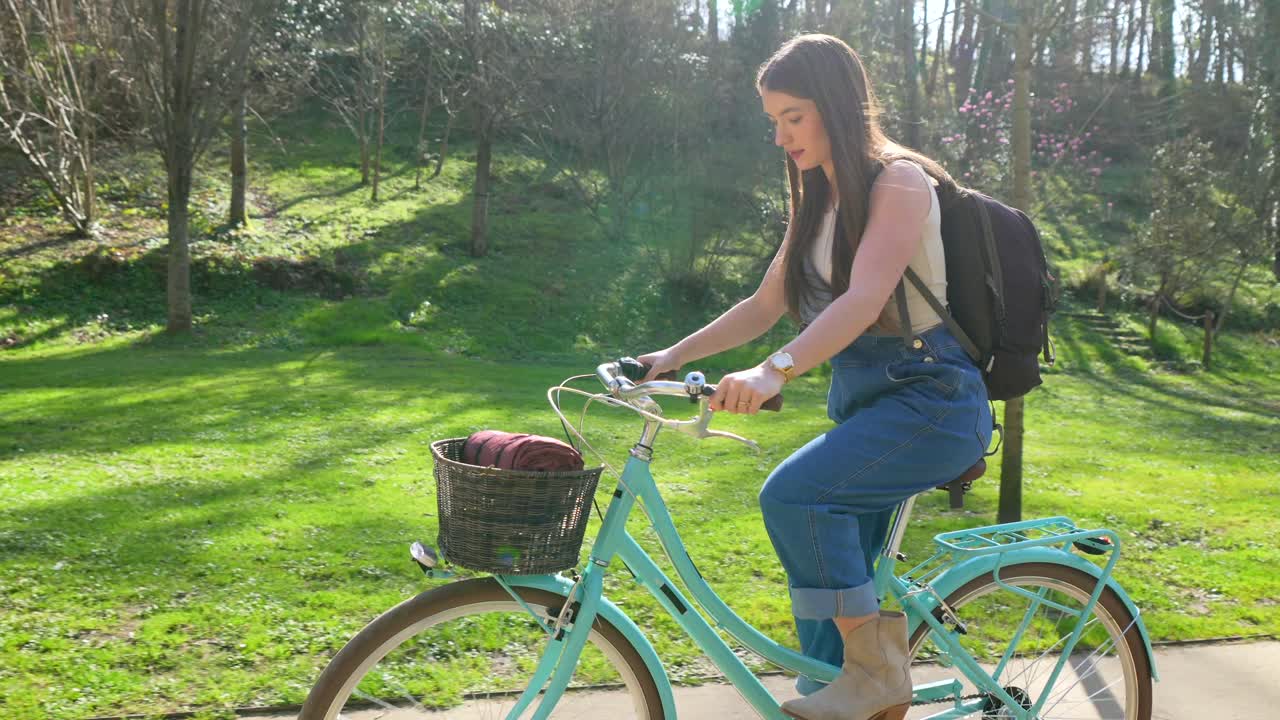 Woman riding a bicycle in the park