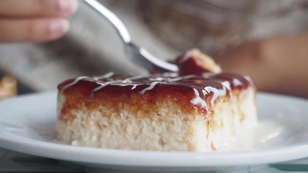 Woman Eating a Slice of Turkish Dessert