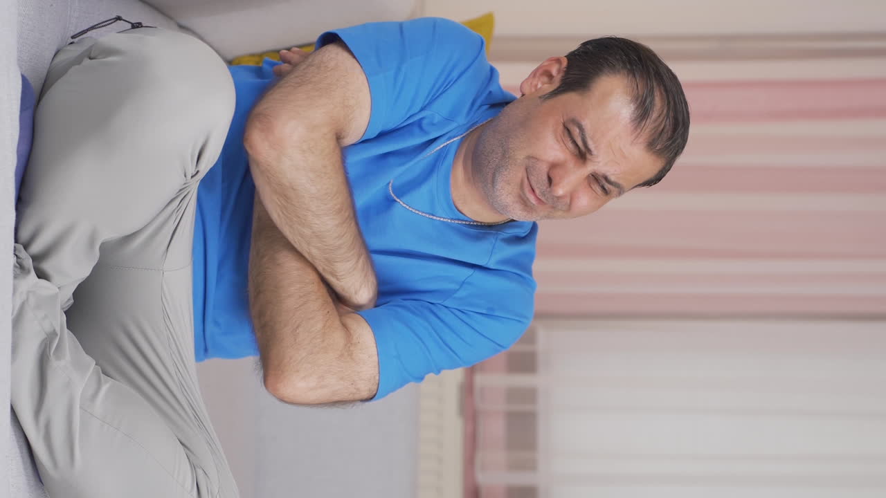 Vertical video of Depressed unhappy man.