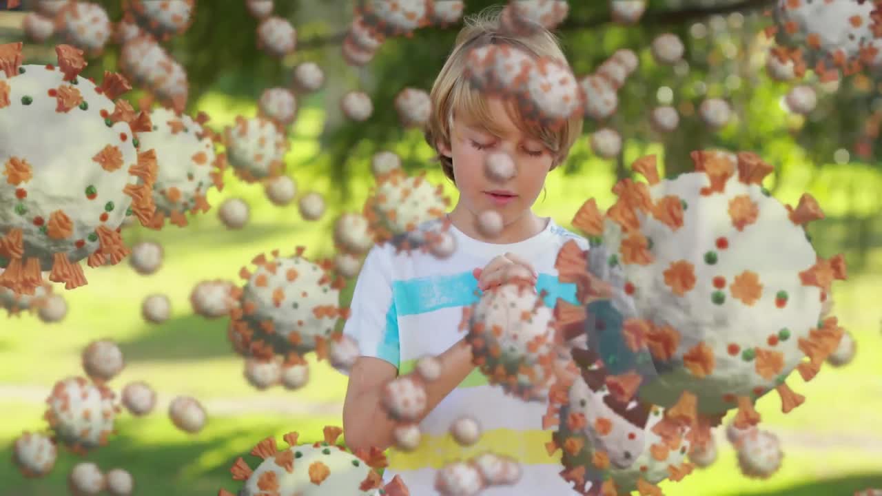 코로나19 세포가 기도하는 소년에게 움직이고 있습니다.