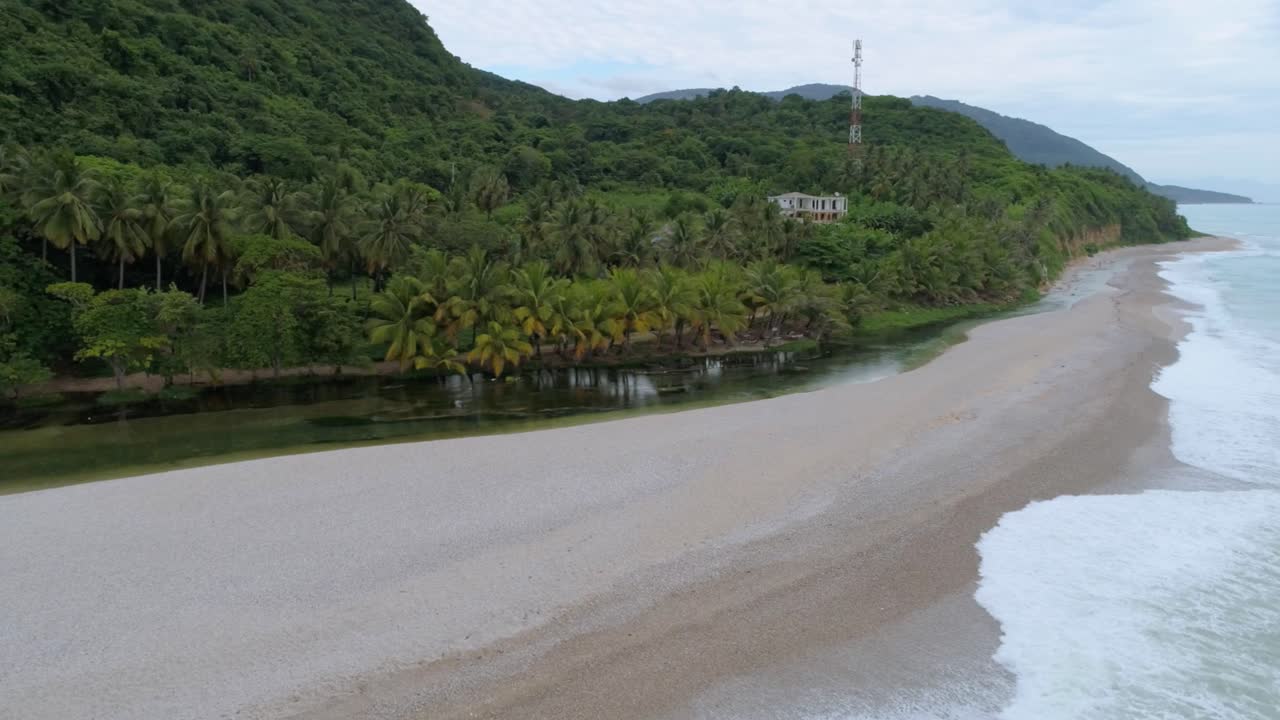 Aerial circling at Barahona and crashing waves, southwest of Dominican Republic