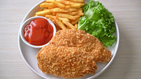 fried chicken breast fillet steak with french fries and ketchup