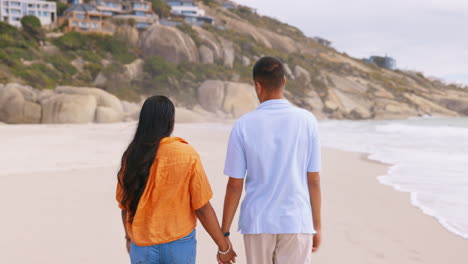 couple, beach and walking while holding hands