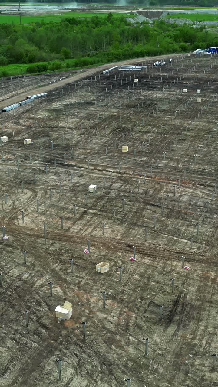Vertical View Of Solar Power Plant Construction Ground. Aerial Shot