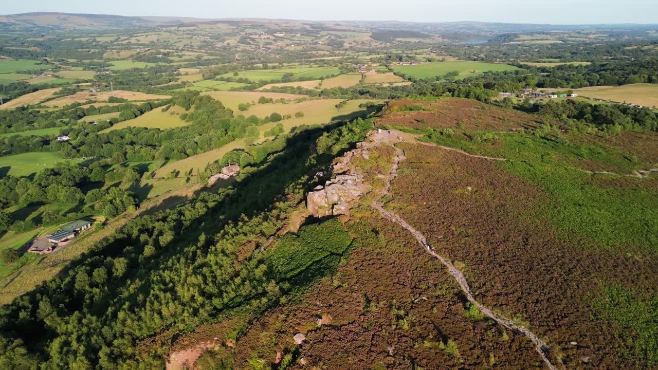 The stunning spiritual Cloud at Bosley on a full moon weekend at sunset , Staffordshire UK - drone clockwise rotate