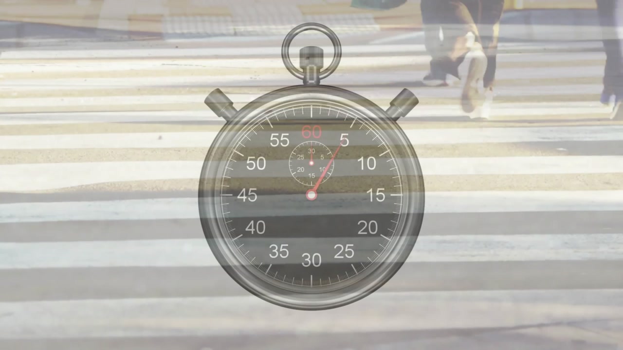 Animation of stop watch over busy city