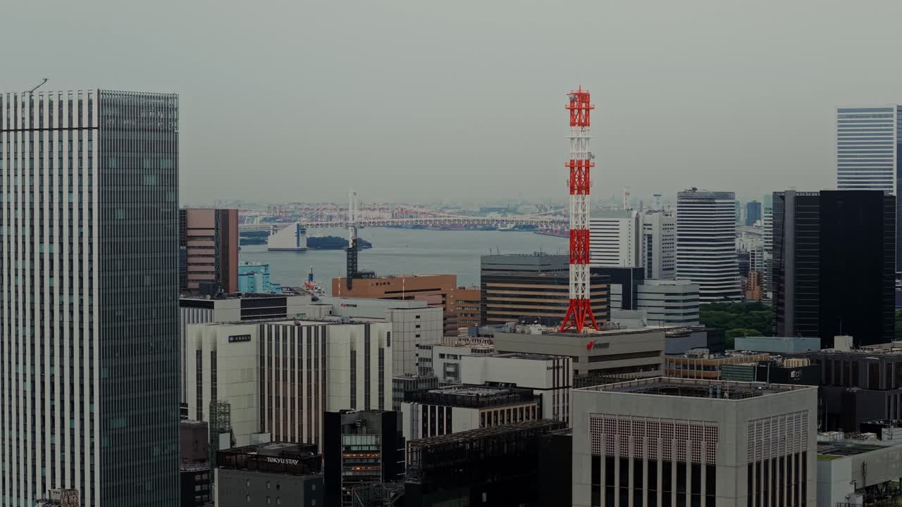 Cityscape featuring skyscrapers and a bridge
