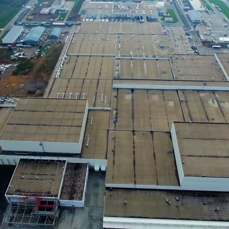 big plant not far from the city. modern enterprise in the countryside. huge factory from above
