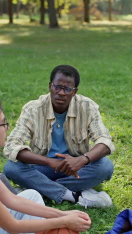 friends talking in a park