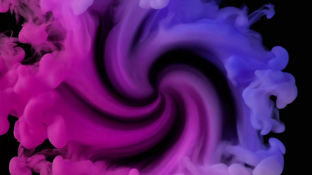 Remolino abstracto de tinta rosa y azul en agua