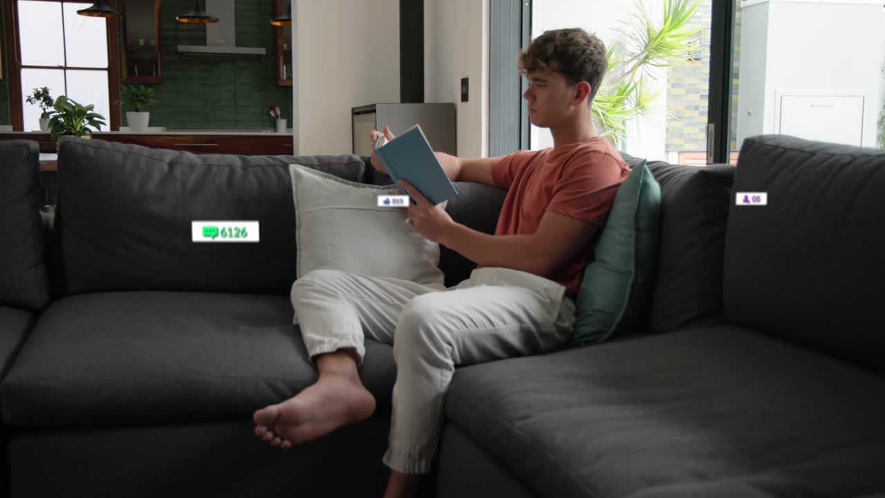 Man sitting on sofa holding book, badges appearing around him, accumulating, guiding marketing