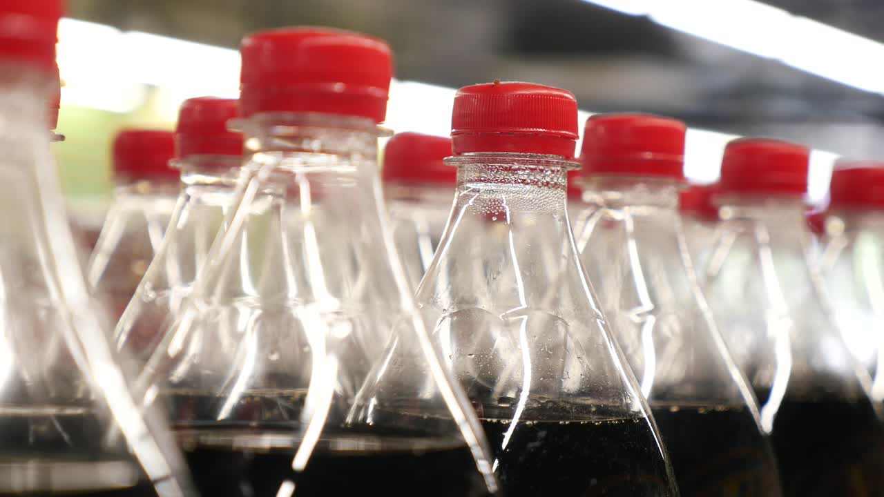 Rows of Coca Cola Bottles