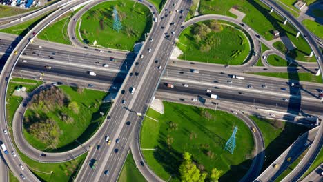 timelapse aerial view of a freeway intersection traffic trails in moscow.