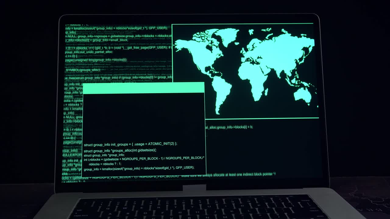Hacker Concept. Code On A Laptop Computer Monitor In A Dark Room