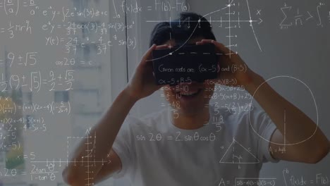 Animation-of-mathematical-drawings-and-equations-over-man-wearing-vr-headset