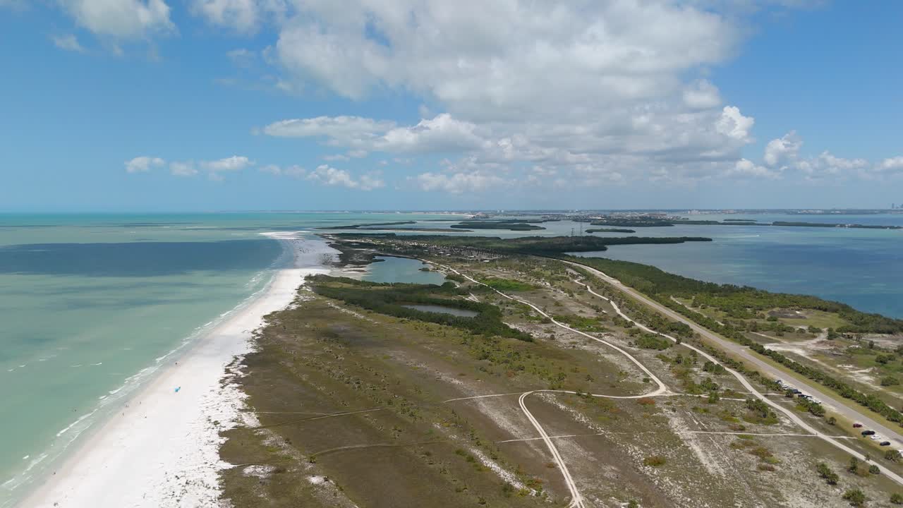 Aerial shot pushing in on Fort De Soto Beach in Saint Petersburg, Florida.