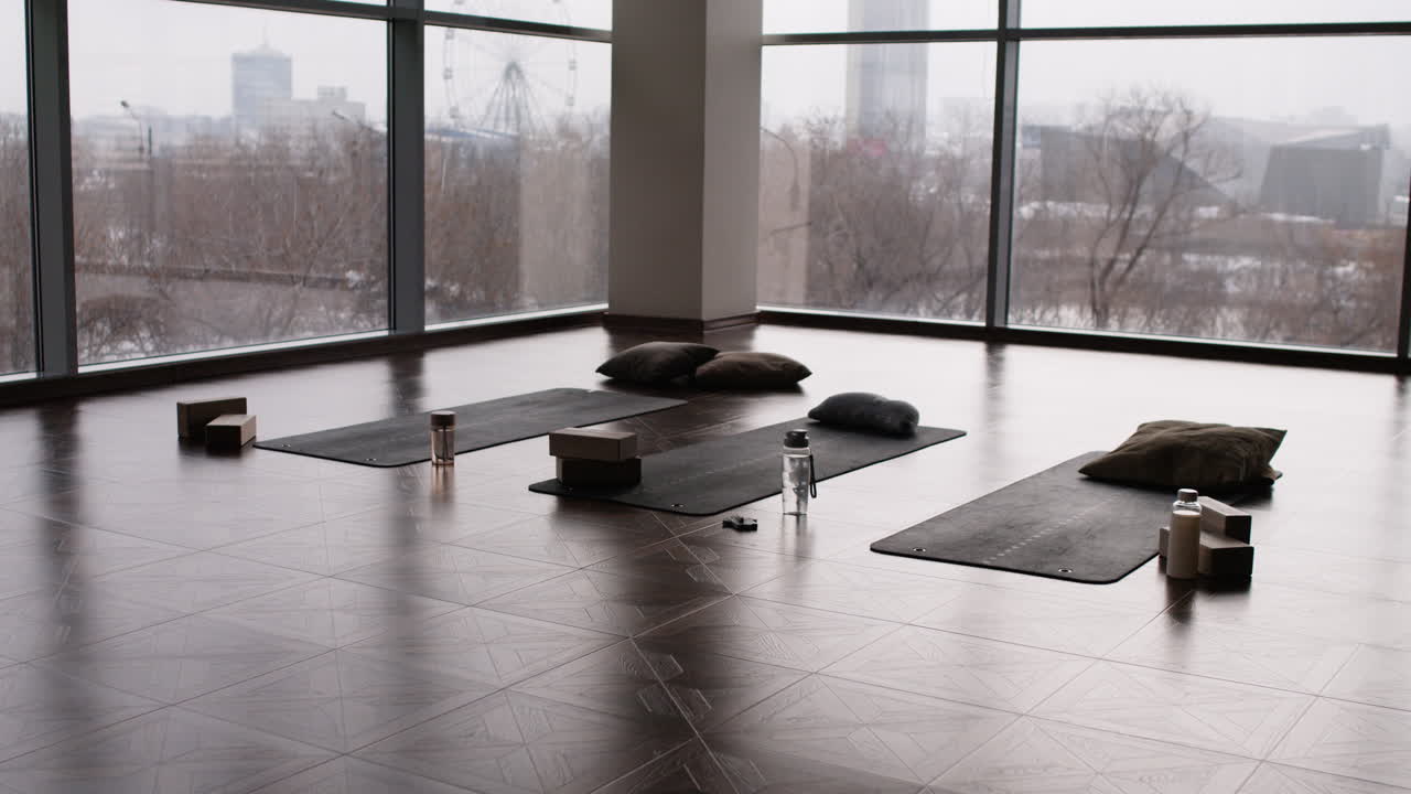 Empty Yoga Studio with City View