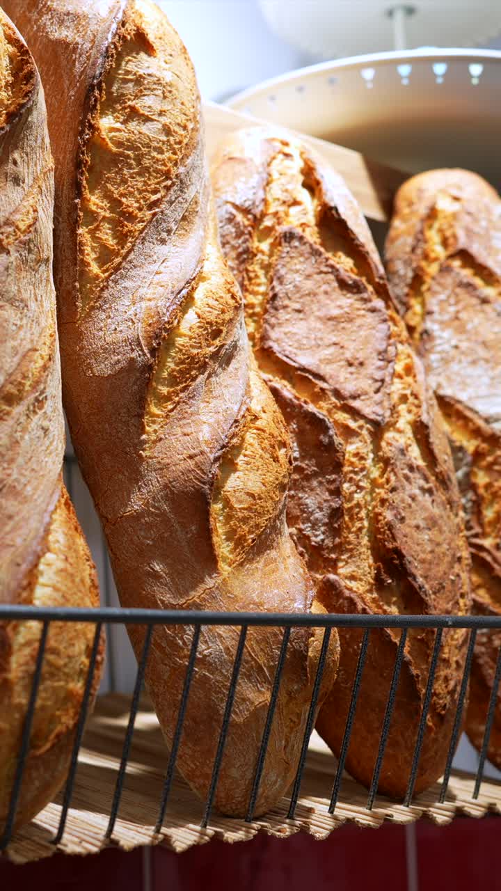 Golden Crusty Baguettes Arranged in a Bakery Display