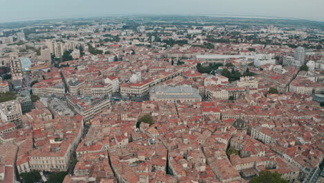 dolly forward drone shot over central montpellier city france