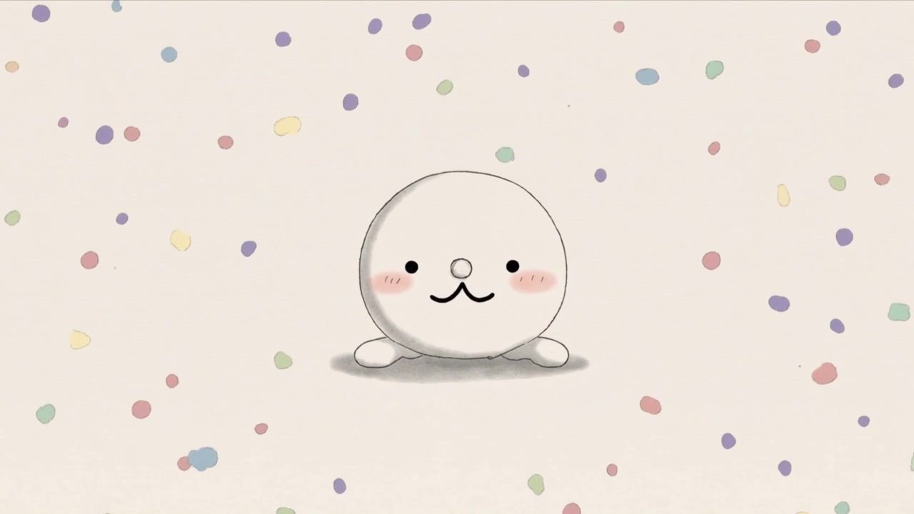 アイドルループが開始され、クリーム色の中心で点滅する丸い白いキャラクターがパステルカラーのドットと共に揺れている。