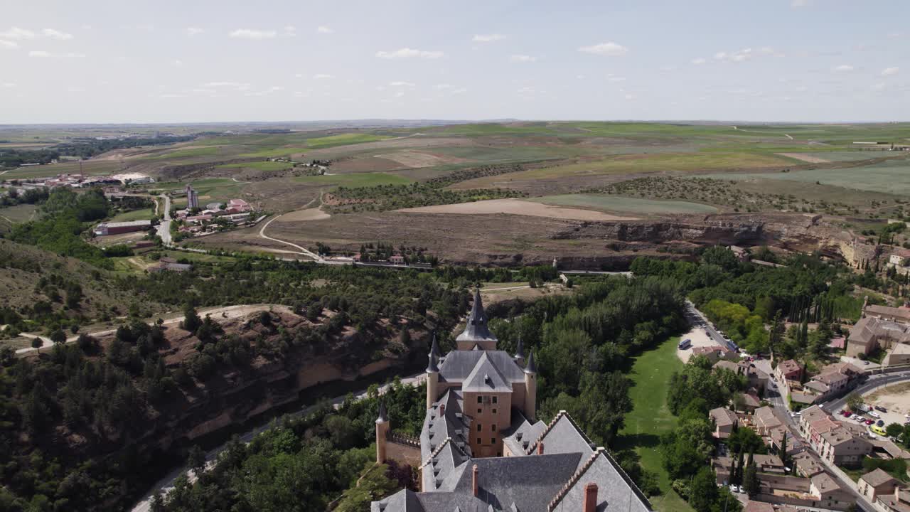 Drone of Alc&aacute;zar de Segovia, standing in striking contrast to the landscape