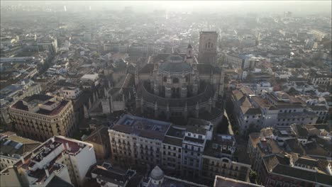 cathedral of incarnation and cityscape on misty day, granada in spain