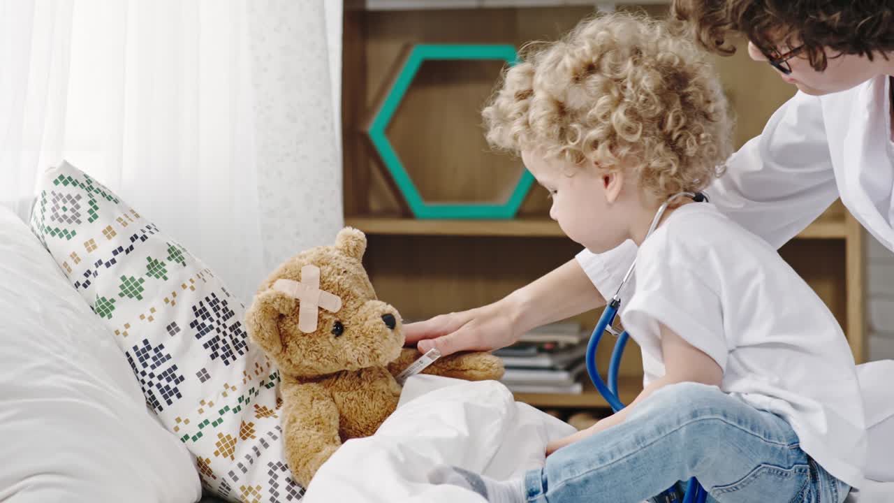Mother and Toddler Boy Playing Doctor | Premium Stock Video Footage