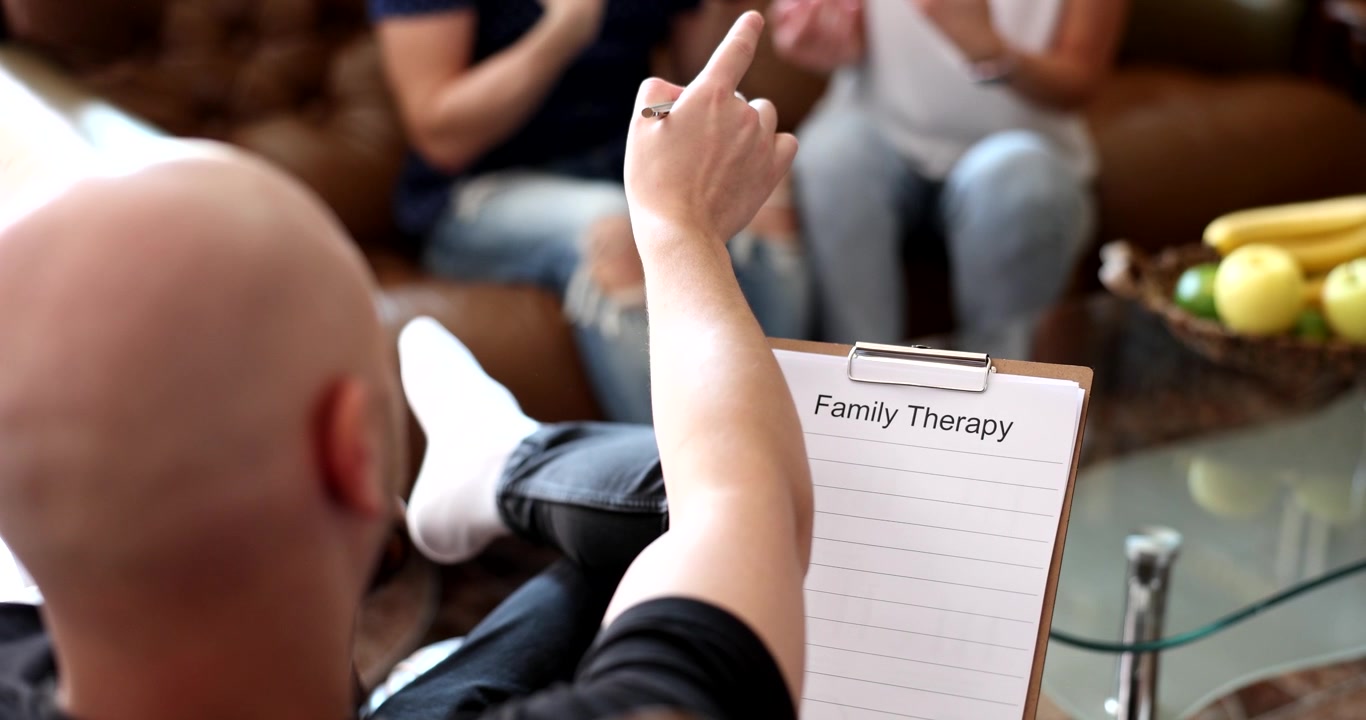 Exploring family bonds and healing through open conversations in a therapy session