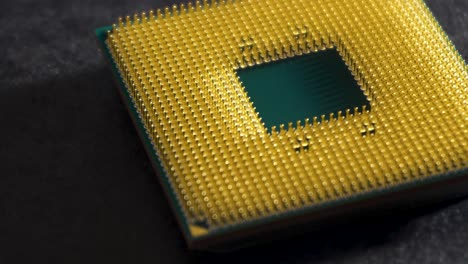 Central processing unit (CPU) outside computer, slow pan left, close up