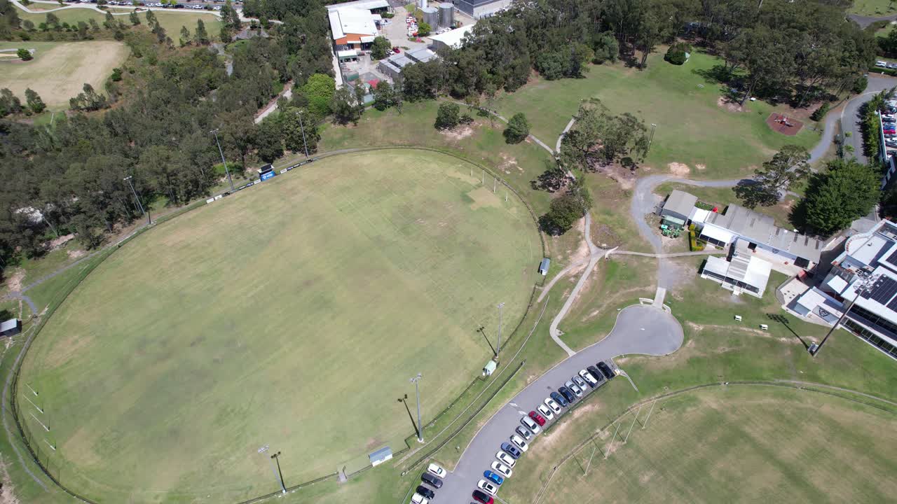 Open Oval Fields Of Southport Sharks Near Gold Coast University Hospital In Southport, Queensland, Australia. Aerial Drone Shot