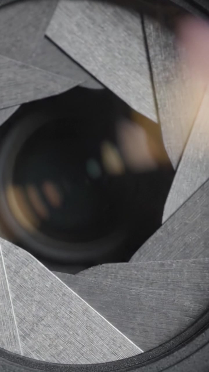 Close-Up of a Camera Lens and Aperture Mechanism Capturing the Intricacies of Photography Equipment Highlighting Frames of a Video