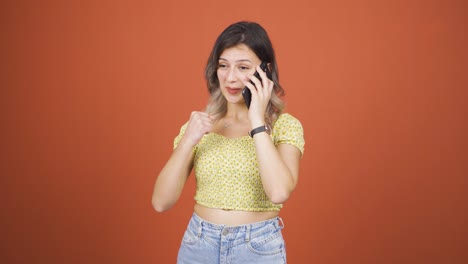 young woman receiving gospel on the phone.