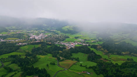 fog blowing green hills landscape drone view. countryside slopes environment