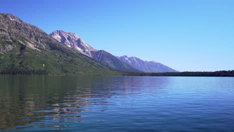 view of the grand tetons from jenny lake