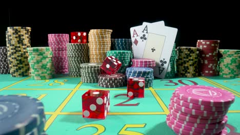 casino table with dice, cards, and chips