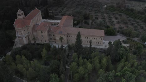 aerial view of a monastery in a scenic landscape