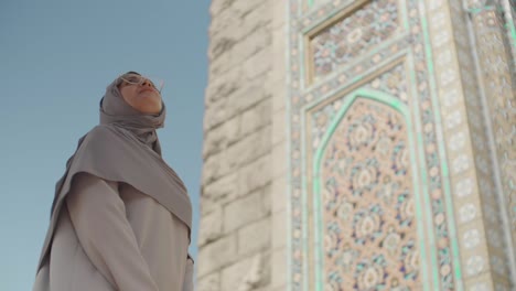 beautiful mixed-race woman enjoying mosque