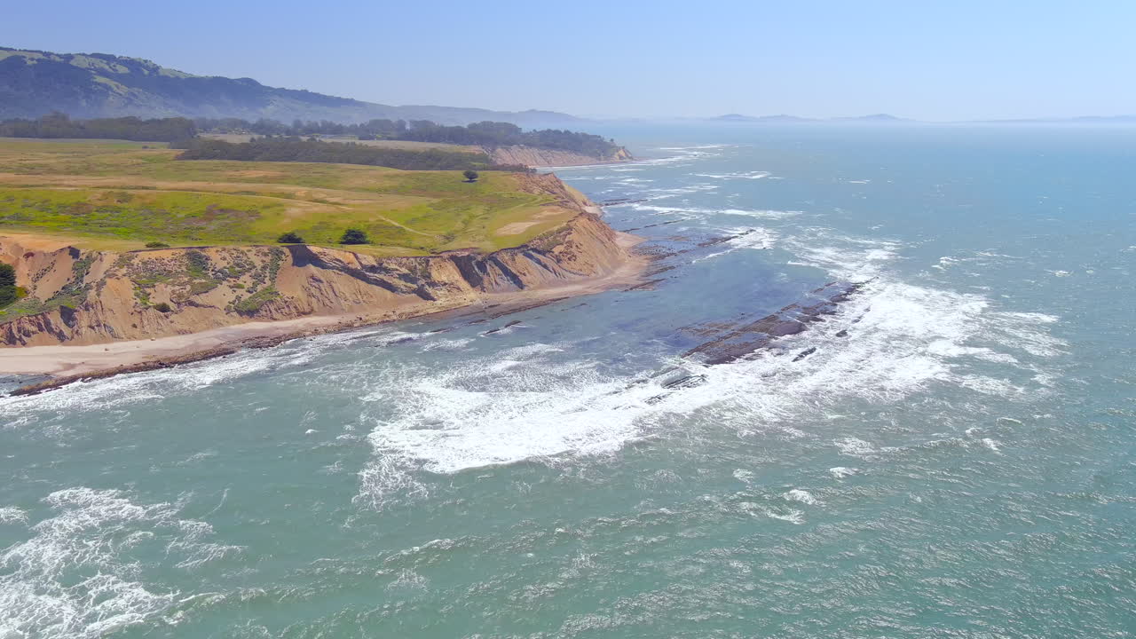 Cliffs along the California Pacific coast at RCA Beach near Bolinas - aerial parallax