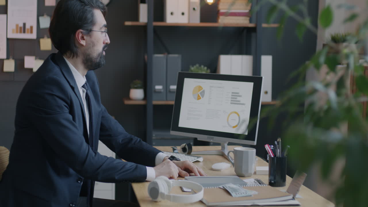 Businessman working on computer in office