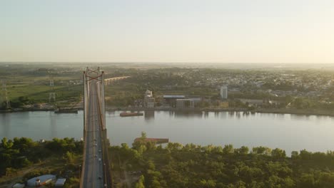 Orbital-of-Zarate-Brazo-Largo-road-and-railway-complex-cable-stayed-bridge-connecting-Buenos-Aires-and-Entre-Rios-crossing-Parana-river-at-golden-hour,-Argentina