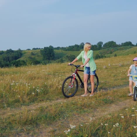 a woman and a child ride bicycles 4