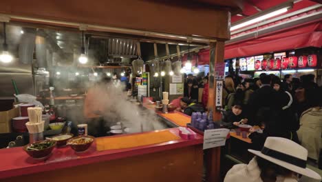 chef cooking at a vibrant outdoor market