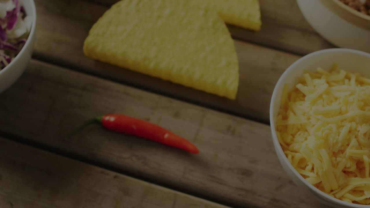 Glowing circuit lines forming over chips, salsa and cheese on surface, converging to form neon TECH