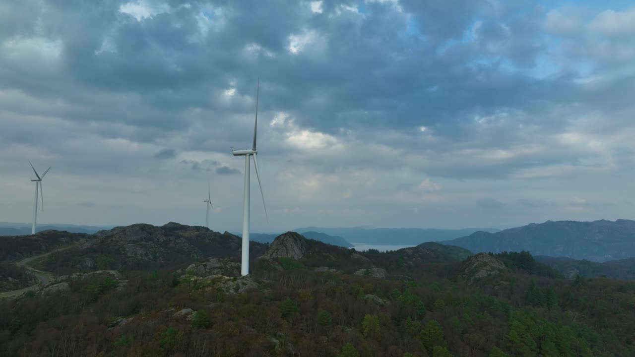 Wind turbines stand tall, generating green energy for a sustainable future.