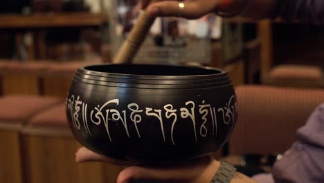 close-up shot of a singing bowl in use