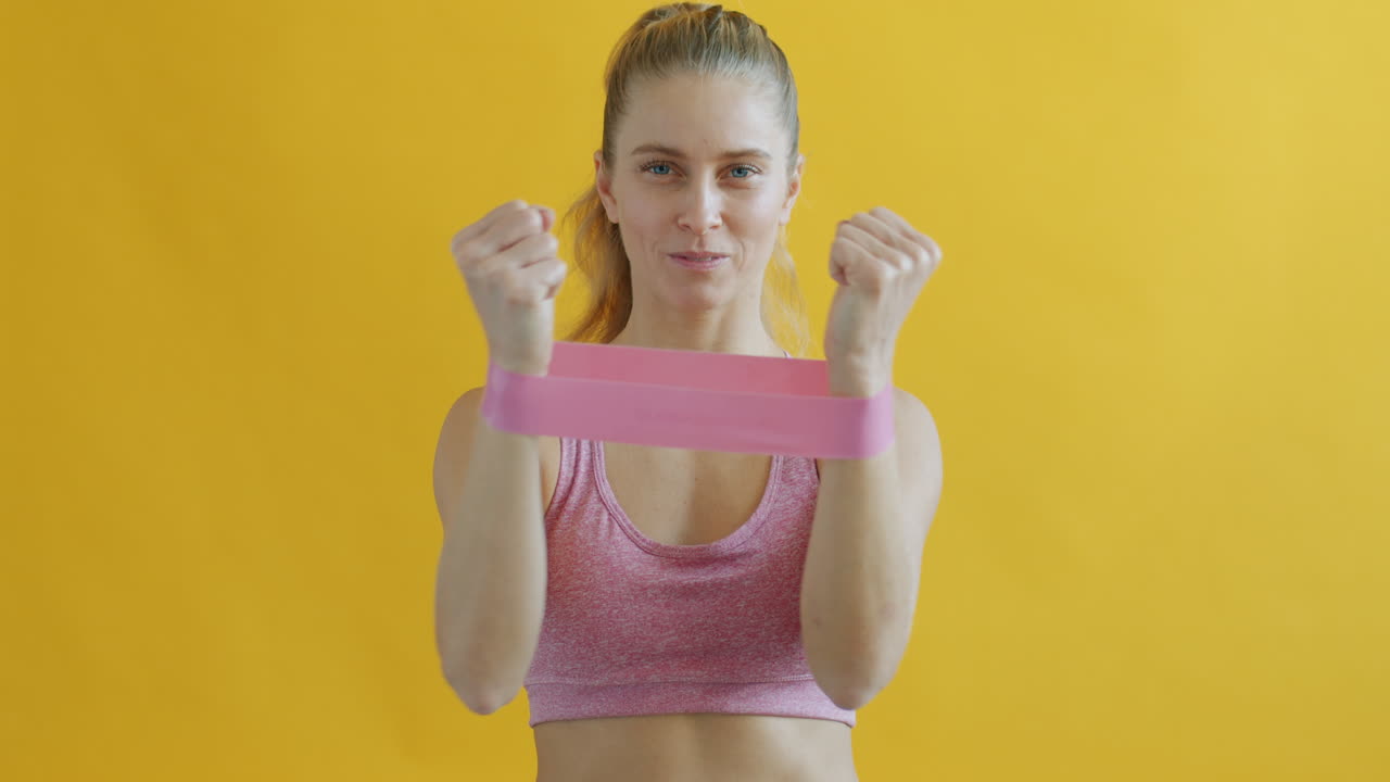 Woman Performing Arm Workout with Resistance Band
