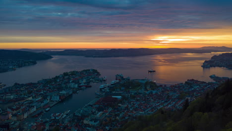 amazing aerial shot over the mountainside of a beautiful sunset in bergen, norway