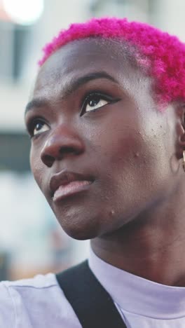 close-up portraits of a person with vibrant pink hair